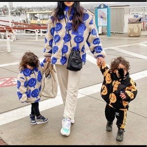 Mommy & me twinning teddy coats with smiley faces